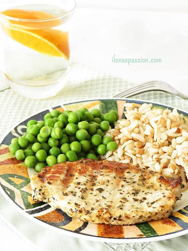 Lemon Basil Pork Chop - Marinated in lemon and basil pork chop is grilled to perfection. Healthy, lemony pork chop is perfect for everyday dinner. Served with rice and green peas by ilonaspassion.com I @ilonaspassion