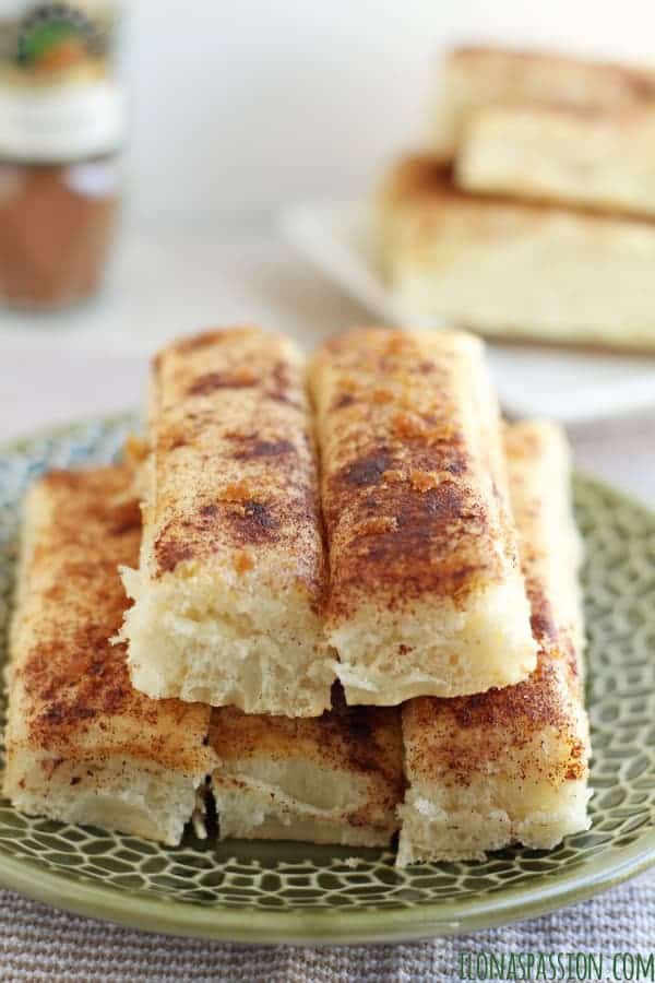 Homemade breadsticks cut into strips, sprinkled with brown sugar. 