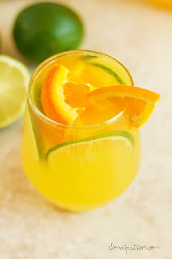 Healthy orange lime refresher recipe made with fresh fruits and sweeten naturally with honey. Cool off with this drink during hot days. by ilonaspassion.com I @ilonaspassion