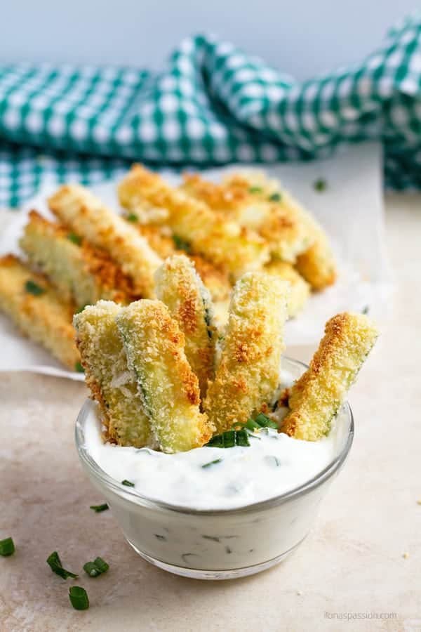 Baked zucchini sticks dipped in garlic dipping sauce.