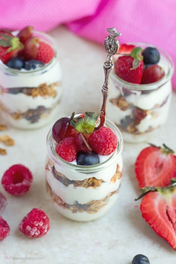 Vanilla yogurt topped with strawberries, grapes, blueberries and raspberries.