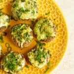 Stuffed mushrooms recipe with mozzarella cheese and grated broccoli are perfect for any party. An easy appetizer that everyone will love! by ilonaspassion.com I @ilonaspassion
