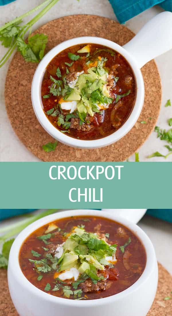 Avocado with sour cream topped on slow cooker chili soup.