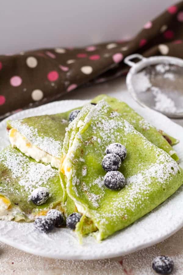 Cheese french crepes with fresh mango, farmer's cheese and spinach 