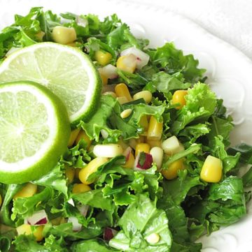 Crunchy Kale Salad with corn, onions and garlic by ilonaspassion.com #kalesalad #kale #recipe