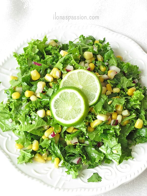 Crunchy Kale Salad with corn, onions and garlic by ilonaspassion.com #kalesalad #kale #recipe