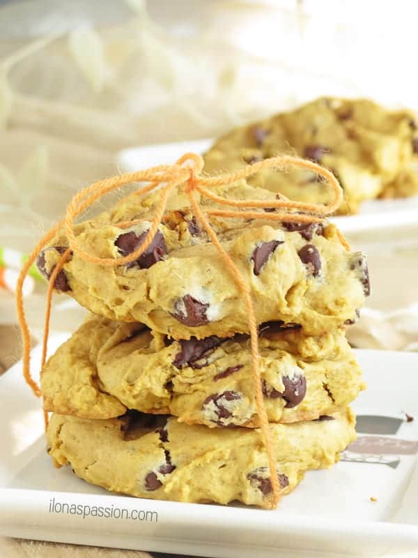 Stack of 3 cookies with chocolate chips.