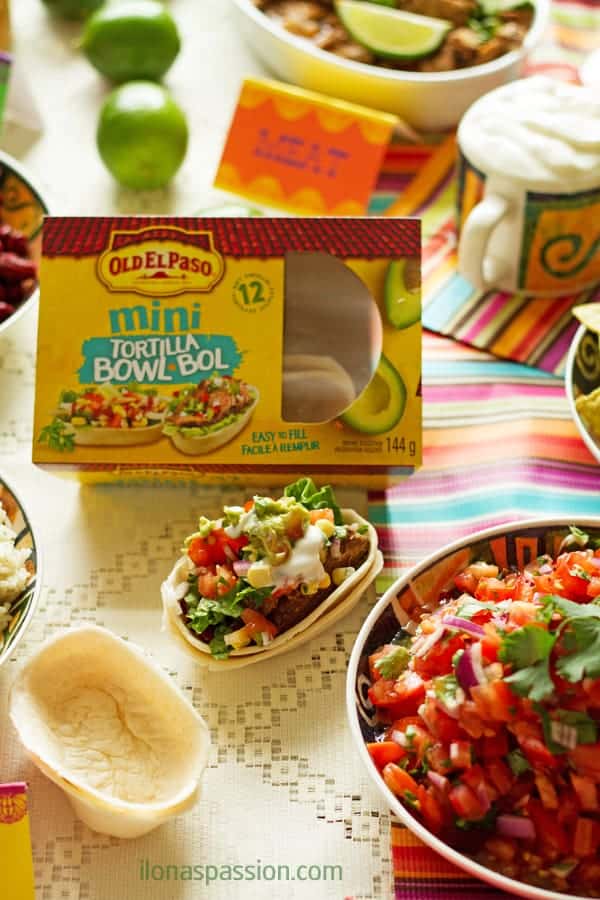 Mexican buffet menu ideas with recipes like barbacoa, lime cilantro rice, avocado dip, beans, tortilla bowls, corn and homemade salsa. Free Mexican printable table tents included! by ilonaspassion.com I @ilonaspassion #CreateYourBowl #ad