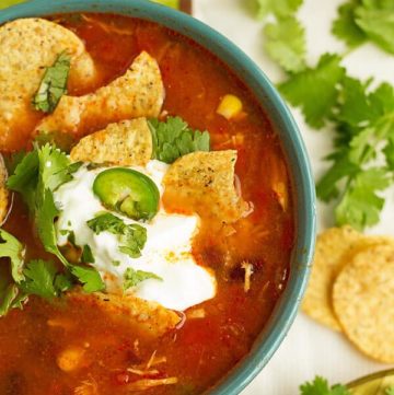 Taco chicken soup is made quickly and easily in crockpot.