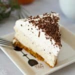 3 layers of homemade eggnog cheesecake including graham cracker crust and whipped cream by ilonaspassion.com I @ilonaspassion