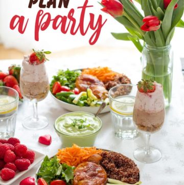 Complete party ideas and tablescape with buddha bowl, chocolate mousse, tulips and berries.