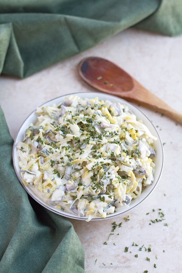 Mushrooms and leeks served in a bowl with mayonnaise, greek yogurt, and eggs.
