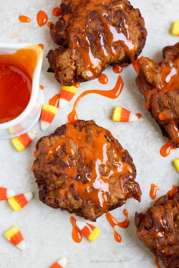 Apple fritters with candy corn sauce.