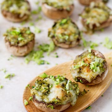 Baked mushrooms with broccoli and cheese.