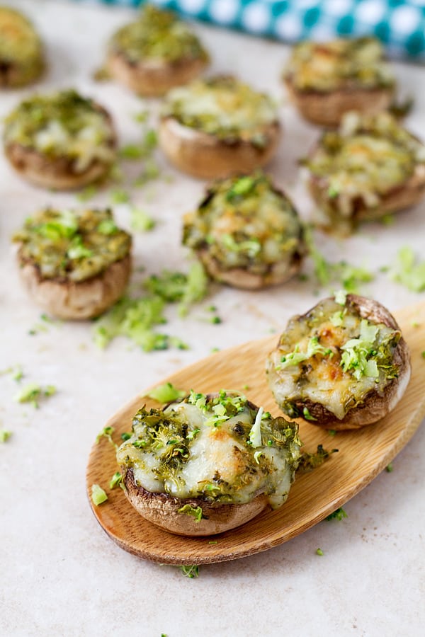 Baked mushroom with broccoli and cheese.