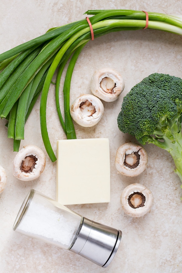 Mushroom caps, broccoli, green onion, mozzarella cheese, salt.