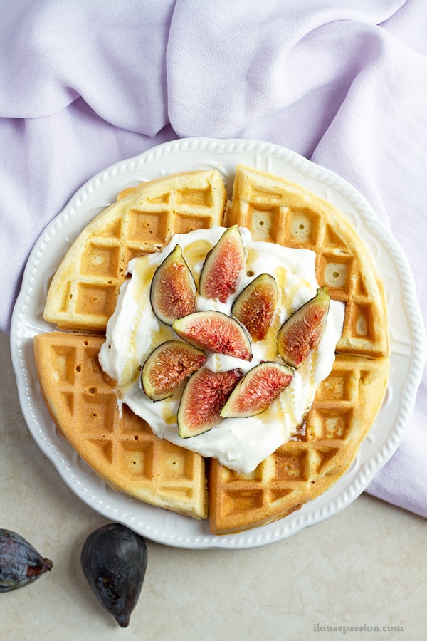 Sweet crispy 4 traiangle waffles with cream and figs.