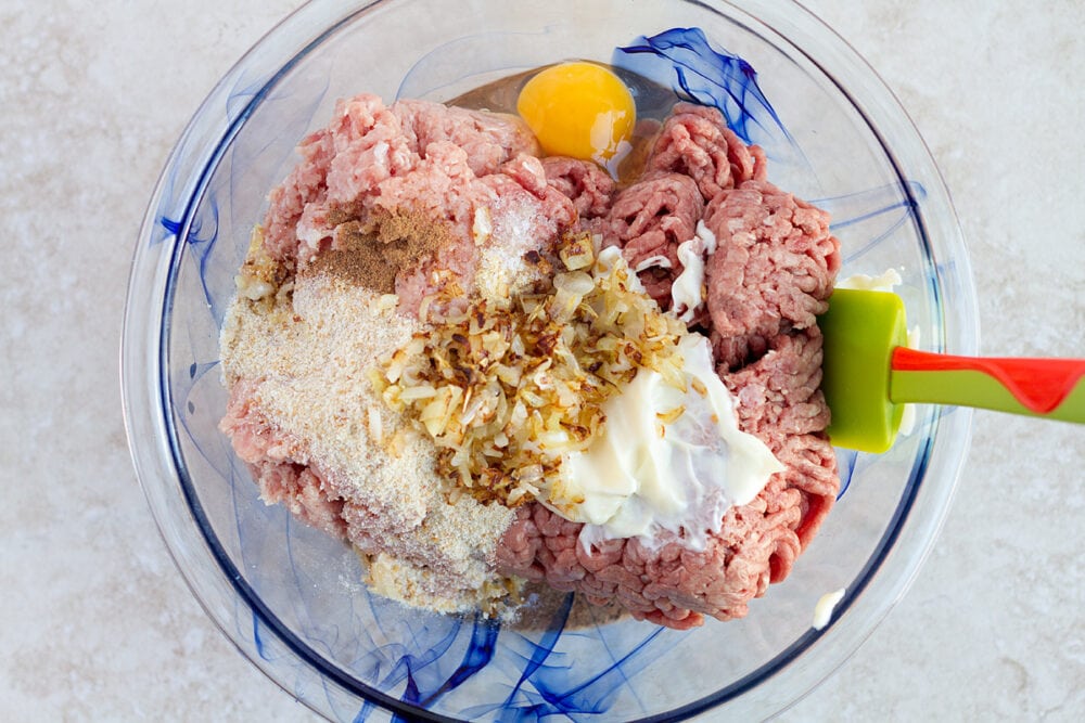Raw minced beef/pork meat with fried onion and spices.