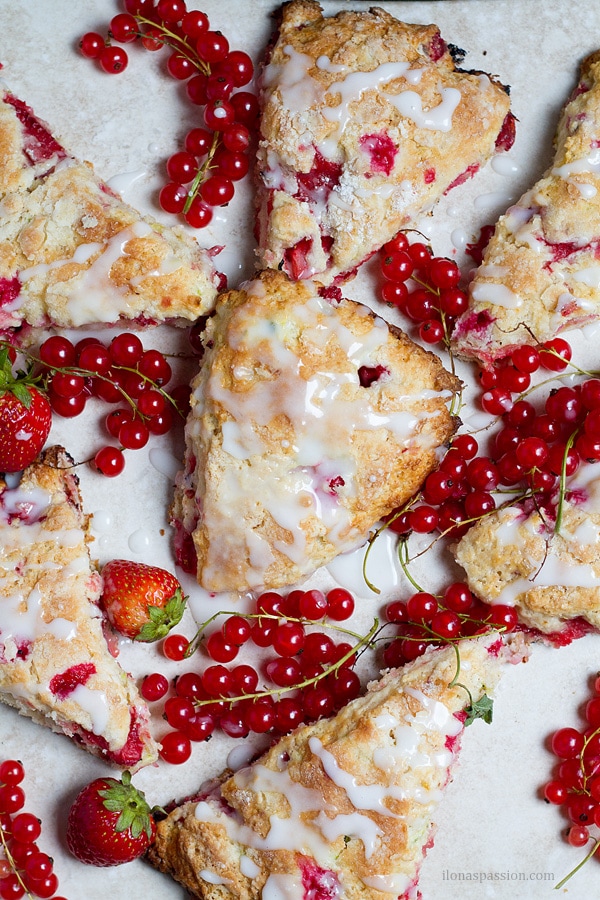 Fresh red currants and baked scones.