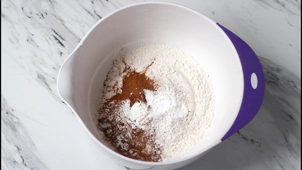 Flour and cinnamon in a bowl.