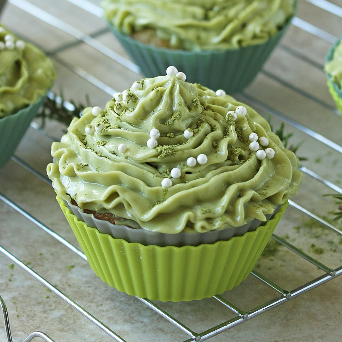 Dessert matcha cupcakes with cream cheese green tea frosting.